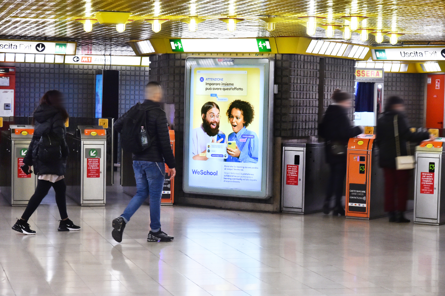 WeSchool's first outdoor advertising campaign in Milan's metro station